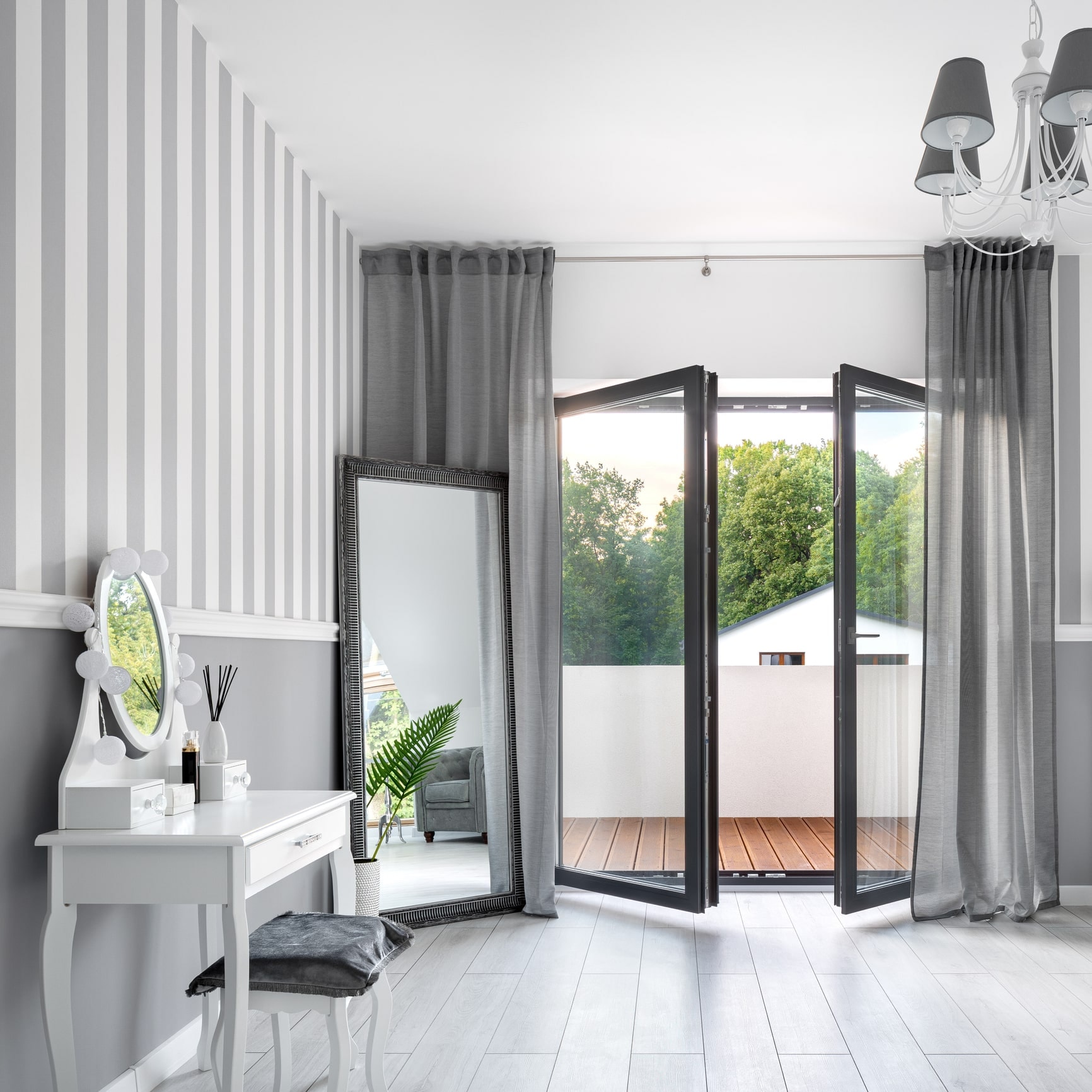 French doors open onto a balcony