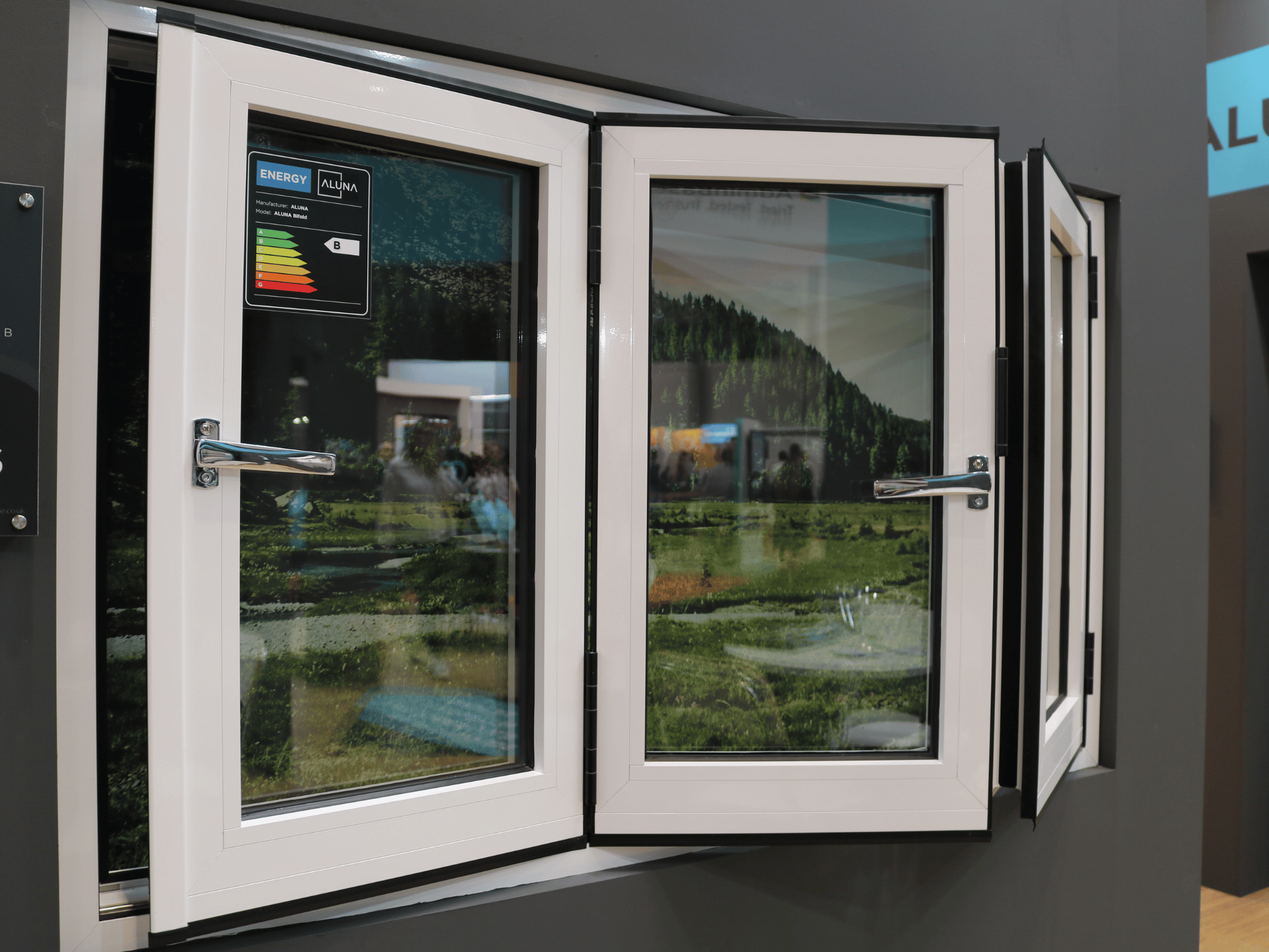 bifold window in white with chrome hardware