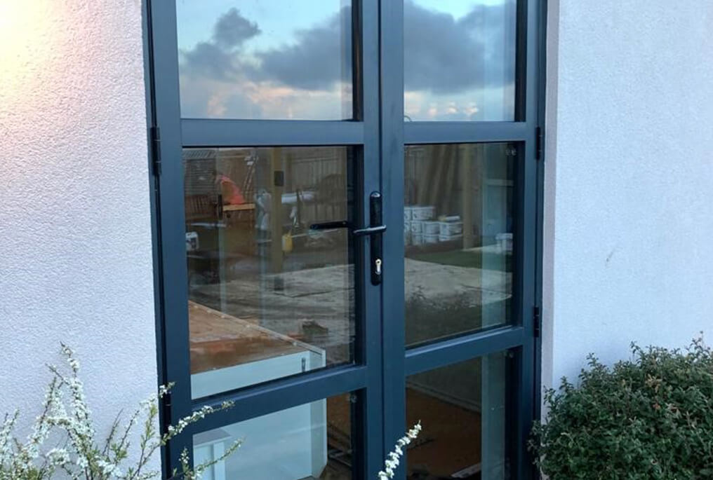 aluminium French doors with heritage style bars