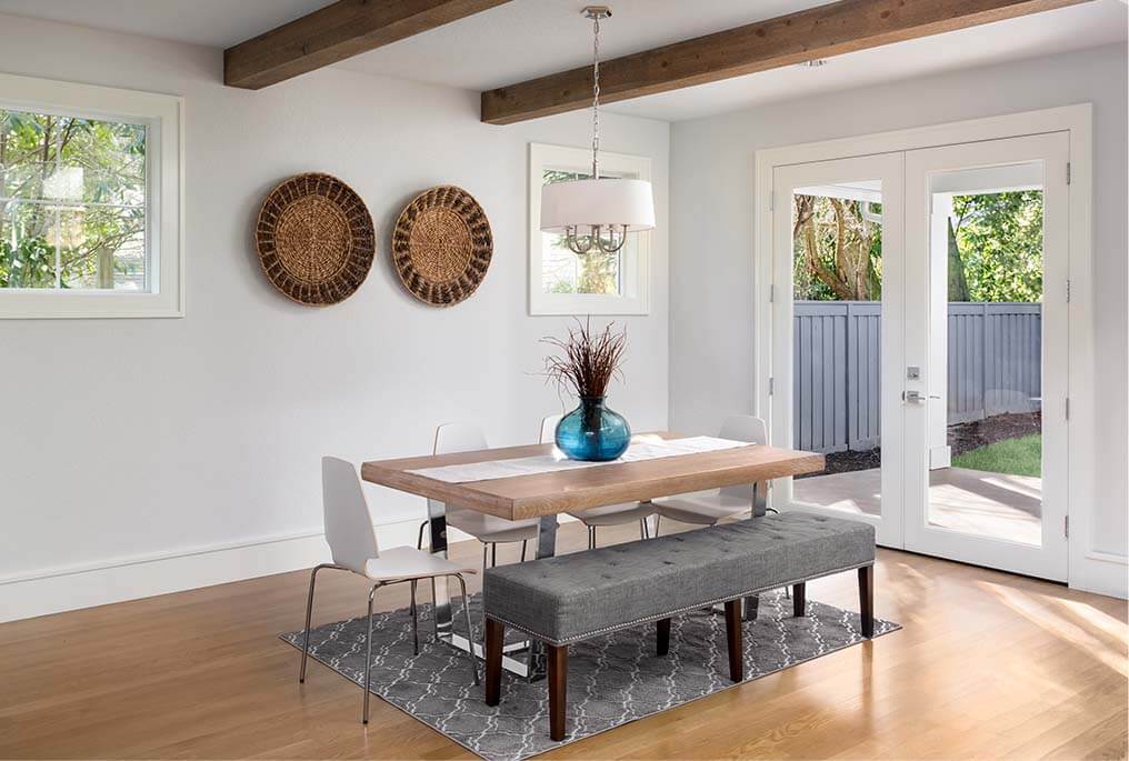 dining room table looking onto French doors